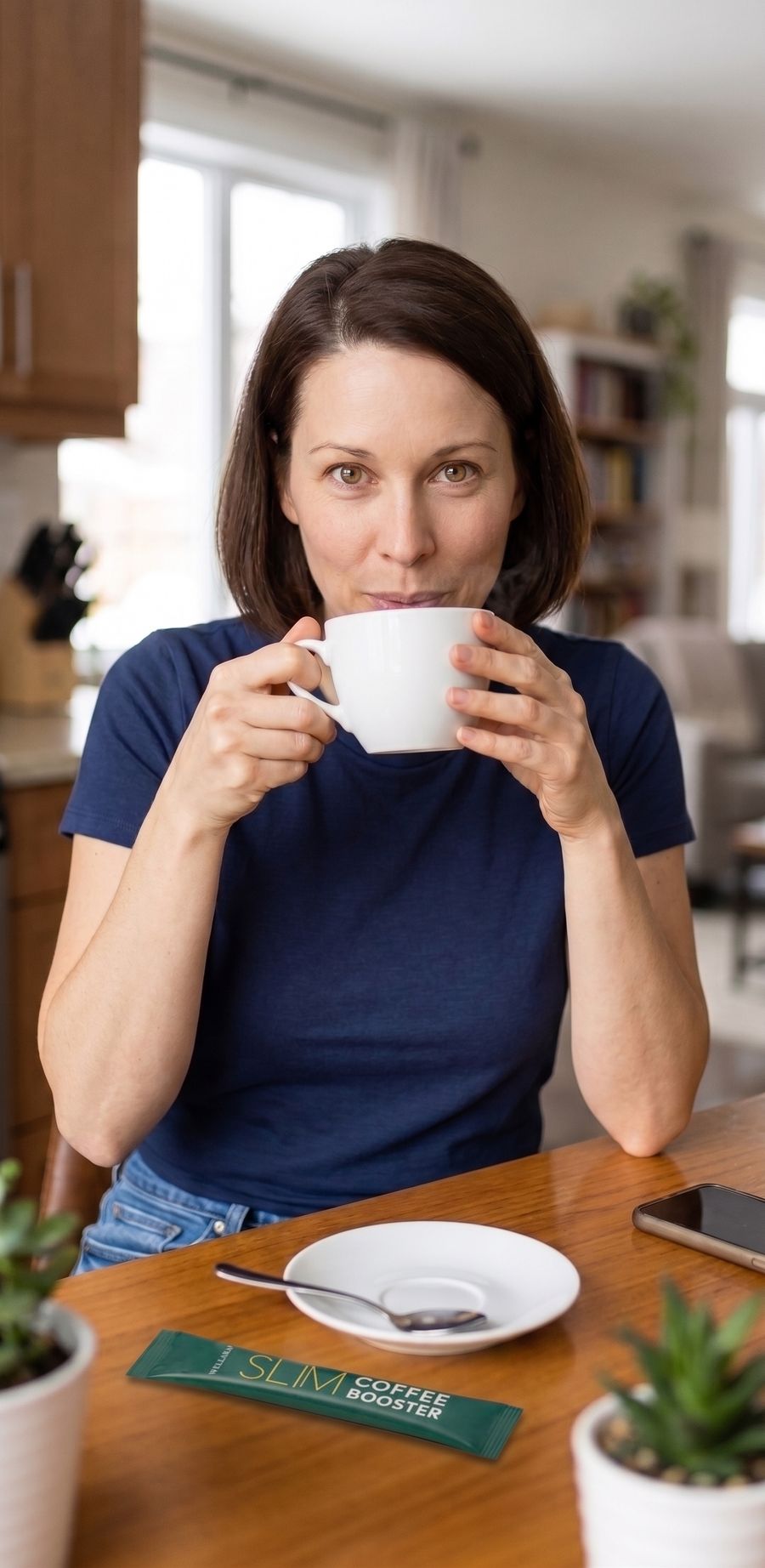Claire with her morning coffee and a Slim Coffee Booster sachet
